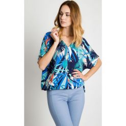 Bluzka z dekoltem w serek i wiązaniem u boku BIALCON. Szare bluzki damskie BIALCON, bez wzorów, eleganckie, z dekoltem w serek, bez rękawów. Za 139,00 zł.