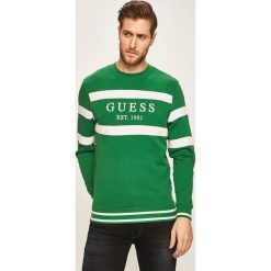 Guess Jeans - Bluza. Zielone bluzy męskie Guess Jeans, s, z nadrukiem, z bawełny, z okrągłym kołnierzem, bez rękawów, bez kaptura. Za 369,90 zł.