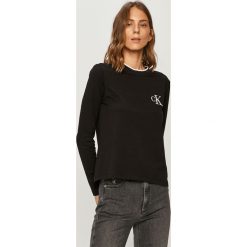 Calvin Klein Jeans - Longsleeve. Białe bluzki damskie Calvin Klein Jeans, s, z aplikacjami, z elastanu, casualowe, z okrągłym kołnierzem. Za 229,90 zł.