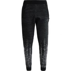 Adidas Performance Z.N.E PULSE Spodnie treningowe black/off white. Czarne bryczesy damskie marki adidas Performance, xl, z elastanu. W wyprzedaży za 356,95 zł.