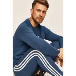 Adidas Originals - Spodnie. Niebieskie spodnie męskie adidas Originals, m, z aplikacjami, z bawełny. Za 249,90 zł.
