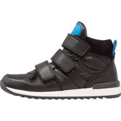 Jochie & Freaks Tenisówki i Trampki wysokie black. Czarne trampki dziewczęce marki Jochie & Freaks, ze skóry. W wyprzedaży za 241,45 zł.