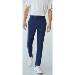 Mango Man - Spodnie Paulo. Niebieskie spodnie męskie Mango Man, z haftami, z elastanu. Za 199,99 zł.