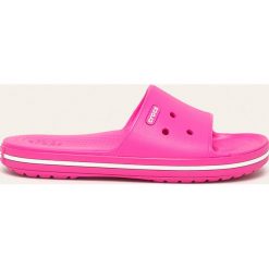 Crocs - Klapki. Żółte klapki damskie Crocs, bez wzorów, z gumy, bez obcasa, na obcasie. Za 129,90 zł.