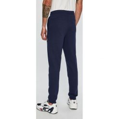 Calvin Klein Jeans - Spodnie. Niebieskie spodnie męskie Calvin Klein Jeans, na co dzień, s, bez wzorów, z bawełny, casualowe. W wyprzedaży za 289,90 zł.