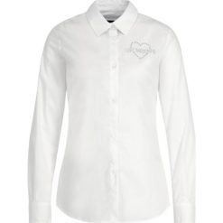 Koszula LOVE MOSCHINO WCB5410S 3296. Białe bluzki damskie Love Moschino, s, bez wzorów, z elastanu, bez kołnierzyka, bez rękawów. W wyprzedaży za 379,00 zł.