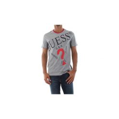 T-shirty z krótkim rękawem Guess M93I04 I3Z00. Szare t-shirty męskie Guess, s, z aplikacjami, bez kołnierzyka, krótkie. Za 119,05 zł.