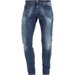 GStar REVEND SUPER SLIM Jeansy Slim Fit trender ultimate stretch denim. Niebieskie jeansy męskie marki G-Star, m, bez wzorów. Za 699,00 zł.