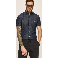 Produkt by Jack & Jones - Koszula. Niebieskie koszule męskie PRODUKT by Jack & Jones, s, bez wzorów, z bawełny, klasyczne, z klasycznym kołnierzykiem, z krótkim rękawem. Za 99,90 zł.