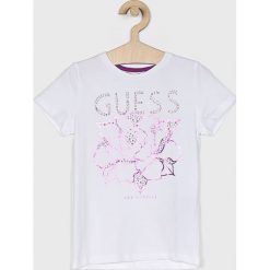 Guess Jeans - Top dziecięcy 118-175 cm. Białe bluzki dziewczęce Guess Jeans, z nadrukiem, z elastanu, z okrągłym kołnierzem, z krótkim rękawem, krótkie, bez kaptura. Za 99,90 zł.