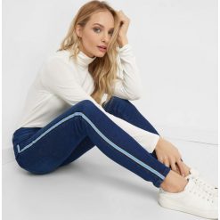 Jeansy skinny z lampasami. Niebieskie jeansy damskie Orsay, z elastanu. Za 119,99 zł.