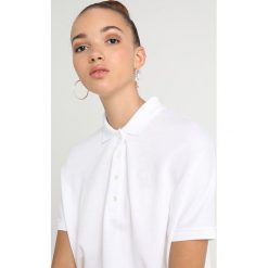 Lacoste NEW OVERSIZED Koszulka polo white. Białe bluzki damskie marki Lacoste, s, z bawełny, polo. Za 509,00 zł.