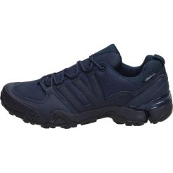Granatowe sportowe buty męskie ATLETICO 8008. Niebieskie buty sportowe męskie Atletico, z materiału, bez zapięcia. W wyprzedaży za 129,00 zł.