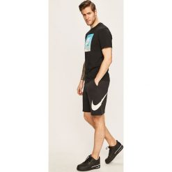 Nike Sportswear - Szorty. Niebieskie spodenki sportowe męskie s, z nadrukiem, z bawełny, sportowe. Za 149,90 zł.