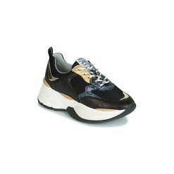 Buty Meline ARGAGALO. Czarne trampki i tenisówki damskie marki Meline, bez wzorów, bez zapięcia. Za 569,00 zł.