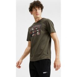 Puma Rebel Camo Koszulka Zielony. Zielone podkoszulki męskie Puma, s, z nadrukiem, z bawełny, z krótkim rękawem. Za 119,95 zł.