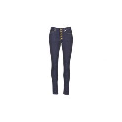 Jeansy slim fit MICHAEL Michael Kors BTTN FRT HW SKINNY. Niebieskie rurki damskie marki MICHAEL Michael Kors, bez wzorów, z jeansu. Za 583,20 zł.