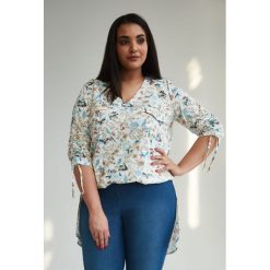 Asymetryczna tunika bluzka OVERSIZE PLUS SIZE WIOSNA. Bluzki dziewczęce Moda Size Plus Iwanek, na wiosnę, bez wzorów, z bawełny, z dekoltem w serek, z długim rękawem, długie, bez kaptura. Za 119,00 zł.