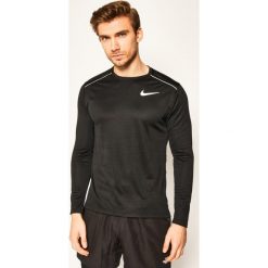 Koszulka techniczna NIKE Miler AJ7568. Szare koszulki męskie Nike, m, bez wzorów, z poliesteru, sportowe, polo, bez rękawów. Za 149,00 zł.