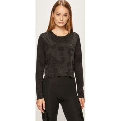 Desigual Sport - Longsleeve. Czarne topy damskie Desigual Sport, s, bez wzorów, z elastanu, z okrągłym kołnierzem. W wyprzedaży za 139,90 zł.