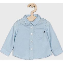 Blukids - Koszula dziecięca 68-98 cm. Niebieskie koszule chłopięce marki Blukids, bez wzorów, z bawełny, klasyczne, z klasycznym kołnierzykiem, z długim rękawem, długie. W wyprzedaży za 37,90 zł.