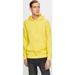 Calvin Klein Jeans - Bluza. Żółte bluzy męskie Calvin Klein Jeans, xl, bez wzorów, z bawełny, z kapturem, bez rękawów, z kapturem. W wyprzedaży za 239,90 zł.