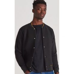 Bluza bejsbolowa - Czarny. Czarne bluzy męskie Reserved, s, bez wzorów, bez kołnierzyka, bez rękawów, bez kaptura. Za 179,99 zł.