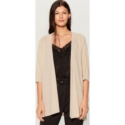 Kardigan oversize - Beżowy. Brązowe kardigany damskie marki Mohito, s. Za 89,99 zł.