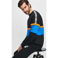 Puma - Bluza. Czarne bluzy męskie Puma, xl, bez wzorów, z elastanu, z okrągłym kołnierzem, bez rękawów, bez kaptura. W wyprzedaży za 219,90 zł.