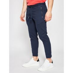 Jeansy Slim Fit Tommy Jeans Scanton DM0DM07825. Niebieskie jeansy męskie Tommy Jeans, m, bez wzorów. Za 389,00 zł.