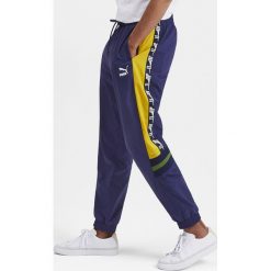 Puma XTG Spodnie dresowe Niebieski. Niebieskie spodnie męskie Puma, m, bez wzorów, z dresówki. Za 311,95 zł.