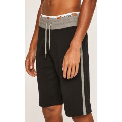 Moschino Underwear - Szorty. Czarne spodenki i szorty męskie Moschino Underwear, m, bez wzorów, z elastanu, casualowe. W wyprzedaży za 449,90 zł.