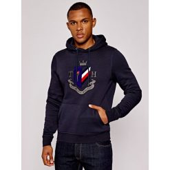 Bluza TOMMY HILFIGER Crest Artwork MW0MW11555. Niebieskie bluzy męskie TOMMY HILFIGER, xl, bez wzorów, bez kołnierzyka, bez rękawów, bez kaptura. W wyprzedaży za 359,00 zł.