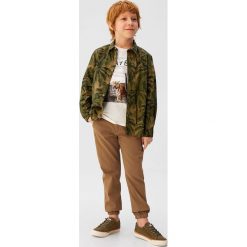 Mango Kids - Spodnie dziecięce Cord 110-164 cm. Spodnie chłopięce Mango Kids, bez wzorów, z elastanu. W wyprzedaży za 69,90 zł.