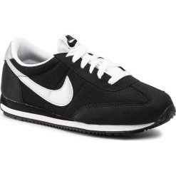 Buty NIKE - Oceania Textile 511880 091 Black/Metallic Silver. Czarne buty sportowe damskie Nike, bez wzorów, z tworzywa sztucznego, sportowe. W wyprzedaży za 199,00 zł.