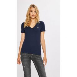 Lacoste - Top. Niebieskie topy damskie marki Lacoste, s, z bawełny. W wyprzedaży za 149,90 zł.