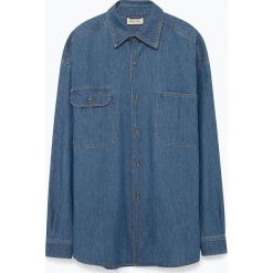 Bluzka "Badidow" w kolorze granatowym. Niebieskie bluzki damskie American Vintage, s, bez wzorów, z klasycznym kołnierzykiem, bez rękawów. W wyprzedaży za 152,95 zł.