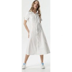 Biała Sukienka Melanippe. Białe sukienki damskie Born2be, s, bez wzorów, z materiału, eleganckie, z klasycznym kołnierzykiem, z krótkim rękawem, krótkie, midi, rozkloszowane. Za 99,99 zł.