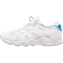 Asics Tiger GELMAI Tenisówki i Trampki white. Białe trampki i tenisówki damskie marki Asics Tiger, z tworzywa sztucznego. W wyprzedaży za 384,30 zł.