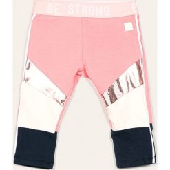 Desigual - Legginsy. Różowe spodnie dziewczęce Desigual, s, bez wzorów, z dzianiny. W wyprzedaży za 119,90 zł.