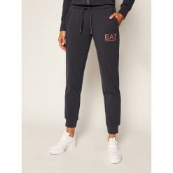 Spodnie dresowe EA7 Emporio Armani 6HTP63 TJ31Z 1543. Niebieskie spodnie damskie EA7 Emporio Armani, xxl, z dresówki. Za 389,00 zł.