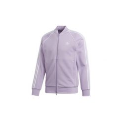 Bluzy dresowe adidas Bluza dresowa SST. Fioletowe bluzy męskie marki Adidas, s, bez wzorów, z dresówki, bez kołnierzyka, bez rękawów, bez kaptura. Za 329,00 zł.