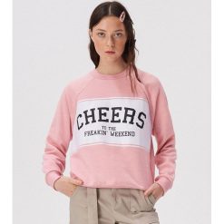 Bluza oversize z nadrukiem - Różowy. Różowe bluzy damskie Sinsay, s, z nadrukiem, bez rękawów, bez kaptura. Za 49,99 zł.