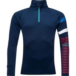 ROSSIGNOL Bluza męska POURSUITE 1/2 ZIP dark navy. Niebieskie bluzy męskie Rossignol, m, bez wzorów, z softshellu, bez kołnierzyka, bez rękawów, bez kaptura. Za 340,00 zł.
