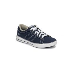 Buty Skechers ARCADE. Niebieskie trampki męskie Skechers, bez wzorów, bez zapięcia. Za 233,10 zł.