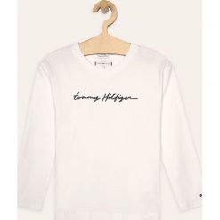 Tommy Hilfiger - Longsleeve dziecięcy 128-176 cm. Białe bluzki dziewczęce TOMMY HILFIGER, z nadrukiem, z bawełny, z okrągłym kołnierzem, z długim rękawem, długie, bez kaptura. Za 139,90 zł.