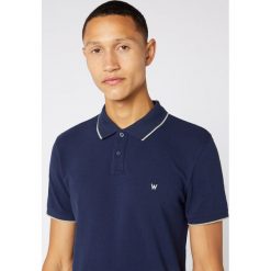 Wrangler Polo Koszulka Niebieski. Niebieskie podkoszulki męskie Wrangler, m, bez wzorów, z bawełny, polo, bez rękawów. Za 154,95 zł.