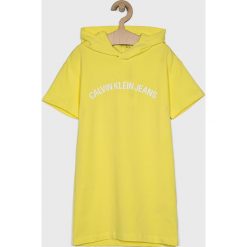 Calvin Klein Jeans - Sukienka dziecięca 128-176 cm. Żółte sukienki dziewczęce marki Calvin Klein Jeans, z nadrukiem, z elastanu, casualowe, z krótkim rękawem, krótkie, mini, proste. Za 299,90 zł.