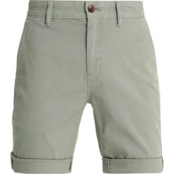 Jeansy męskie: Tommy Jeans STRAIGHT DOBBY Chinosy deep lichen