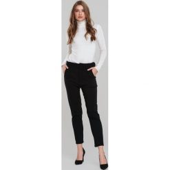 Czarne Spodnie Simplicity. Czarne spodnie damskie Renee, s, w paski, z tkaniny. Za 89,99 zł.